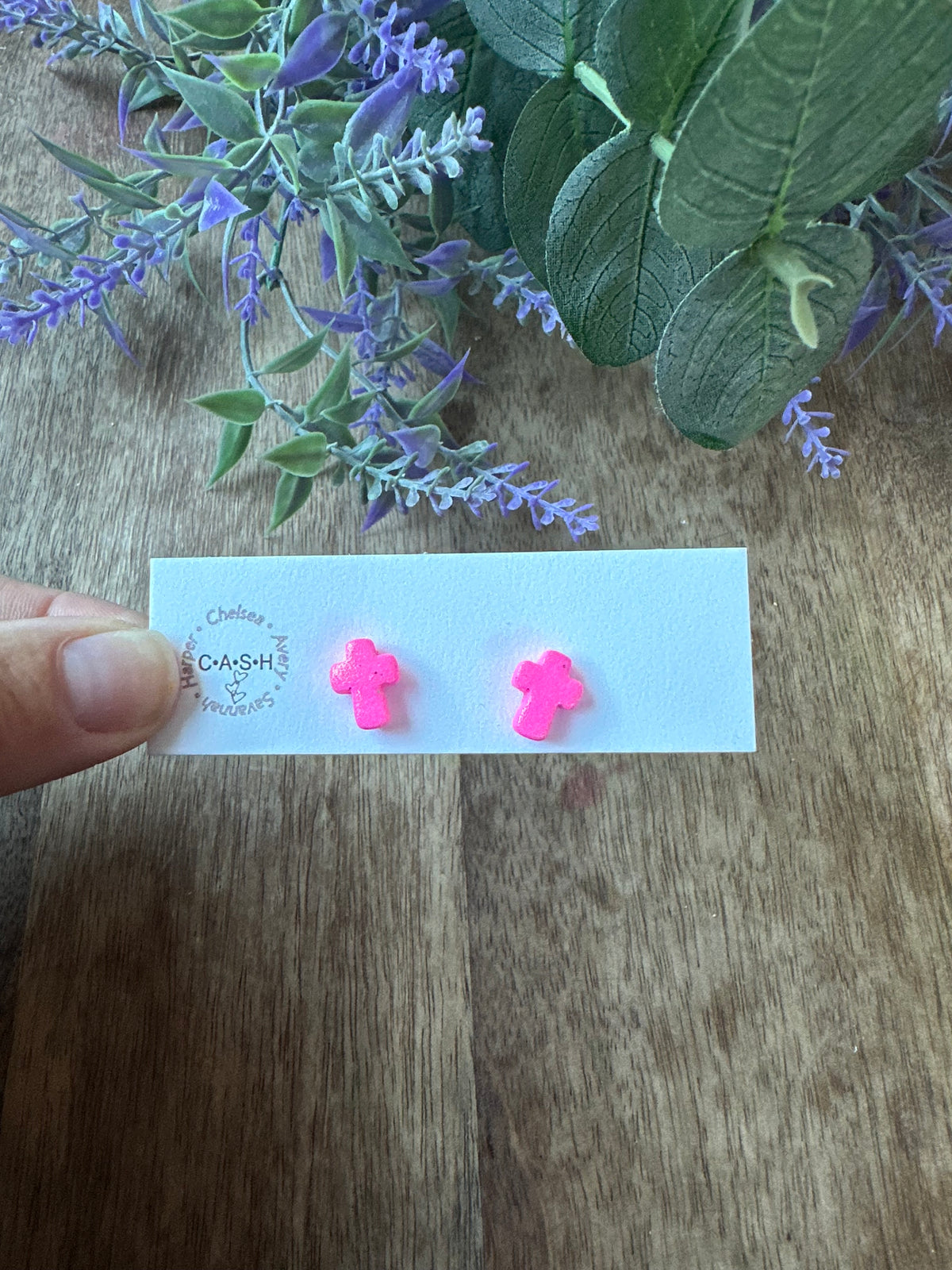 Hot pink glitter cross studs