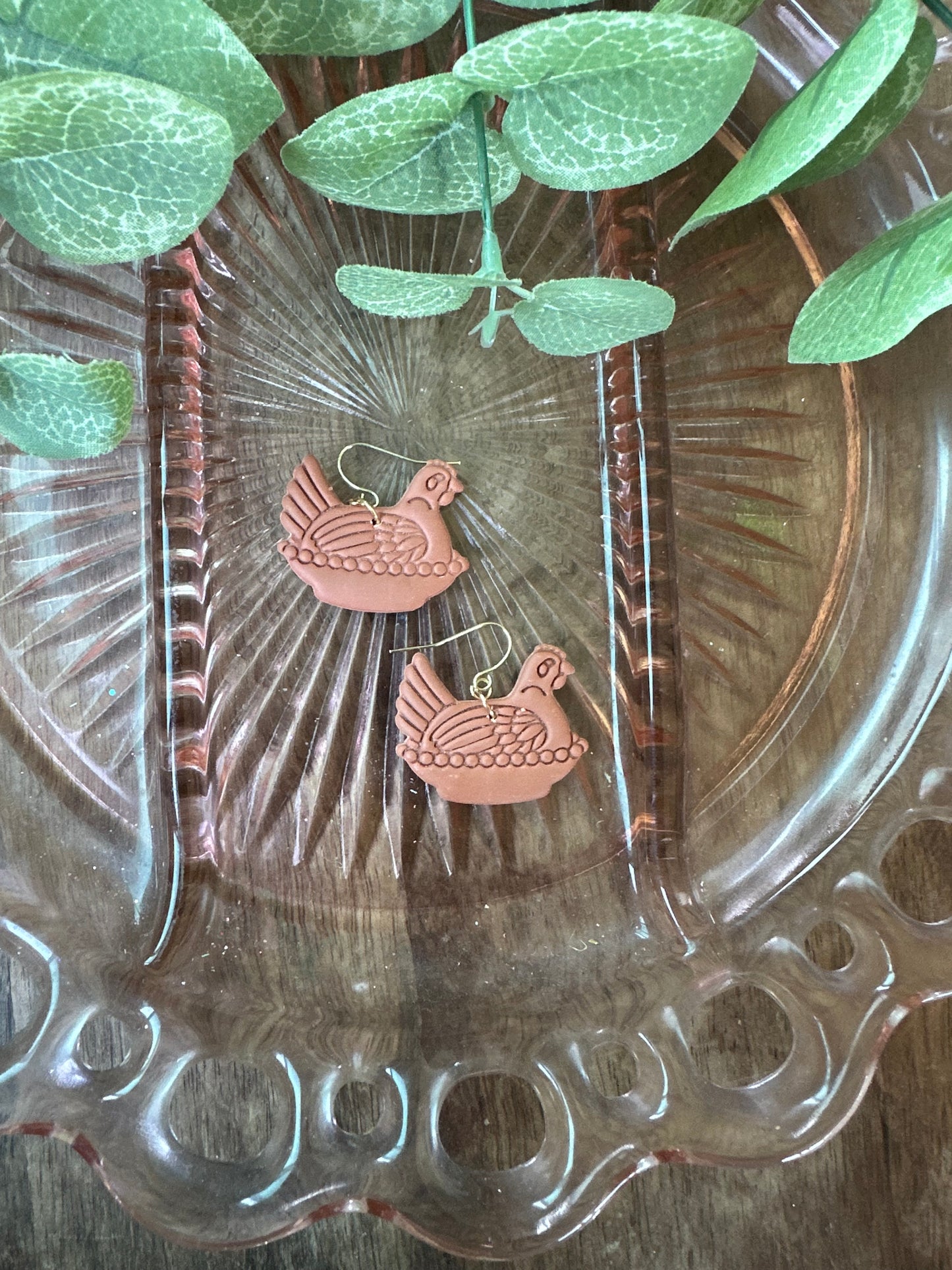 Terra cotta hen dangles