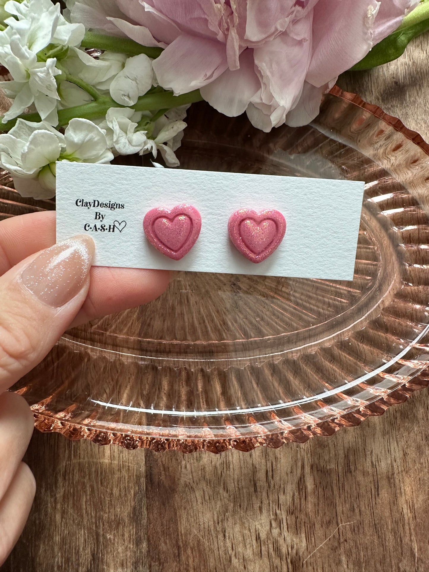 Pink glitter double heart studs