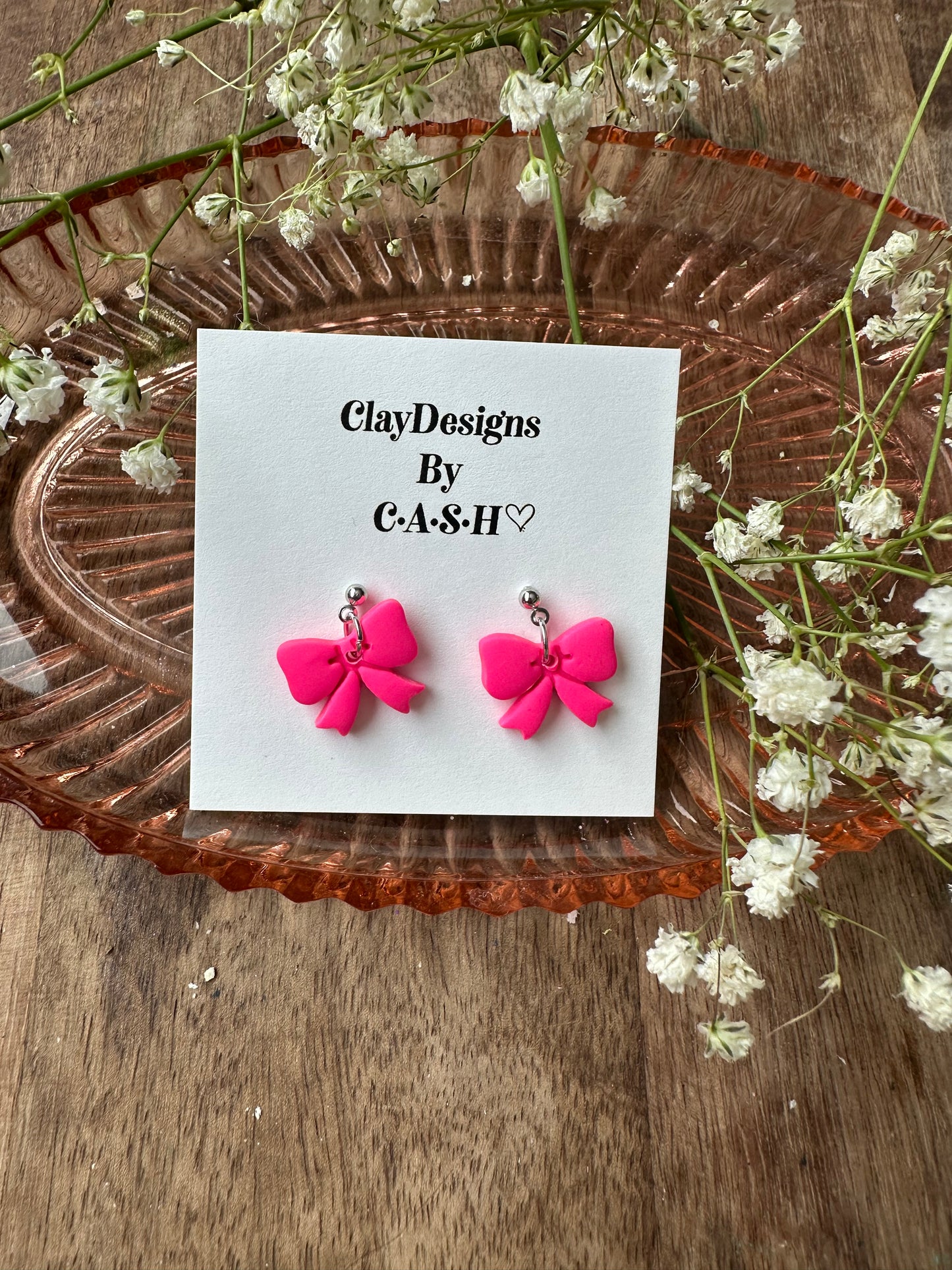 Hot pink bow dangles