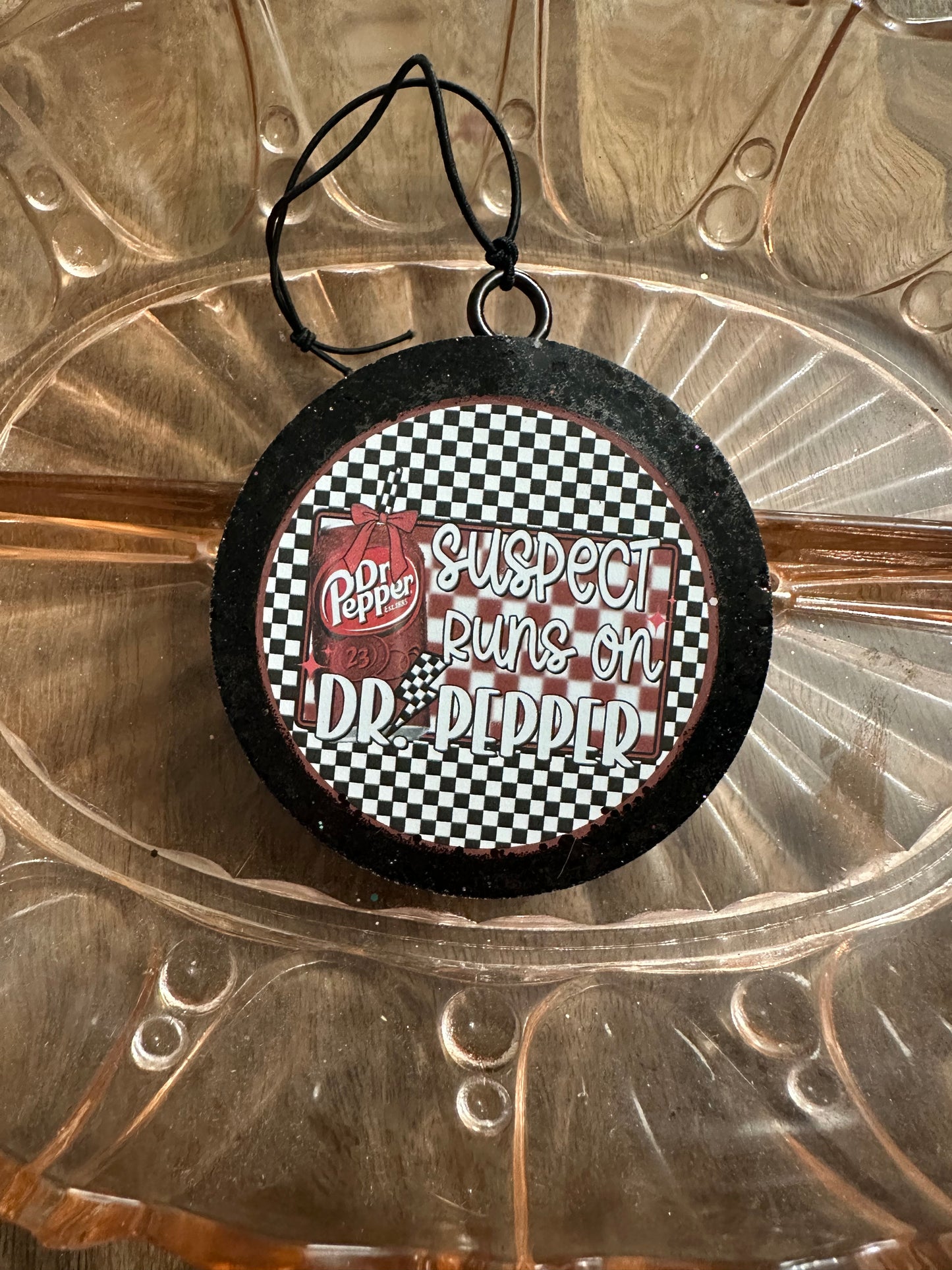 Checkered suspect runs on Dr. pepper freshie