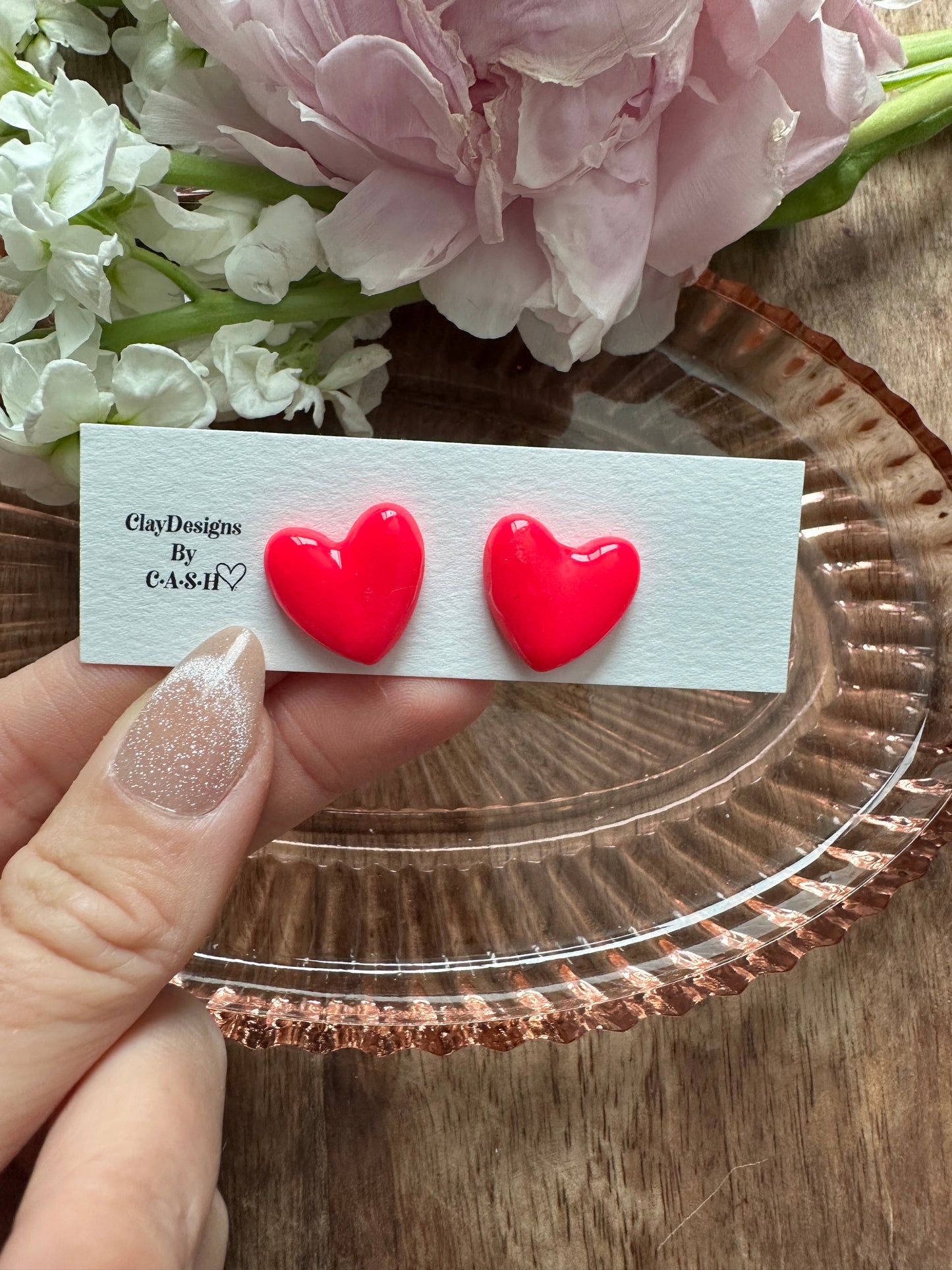 Neon pink heart studs