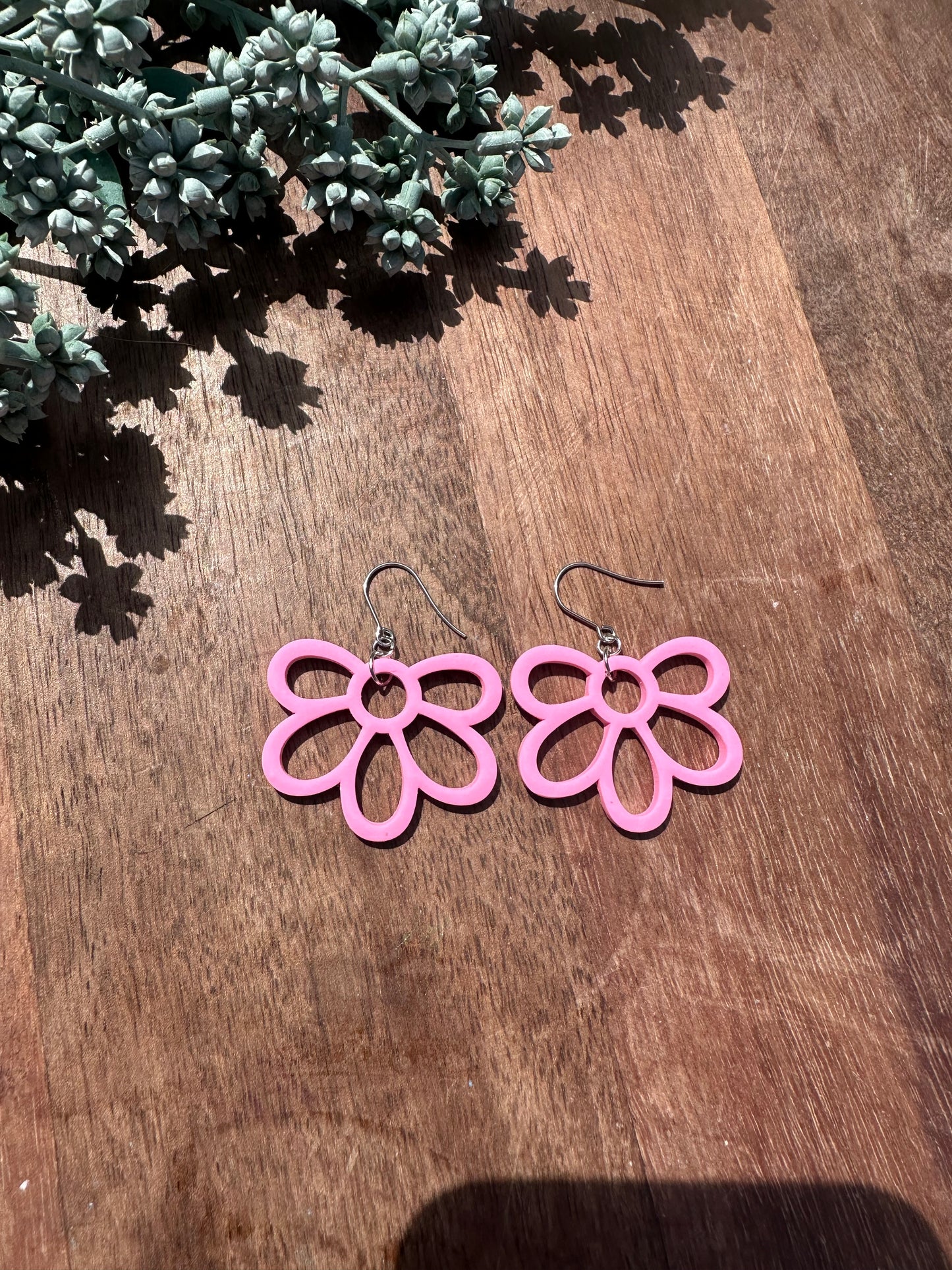 Bright, pink flower outline dangles