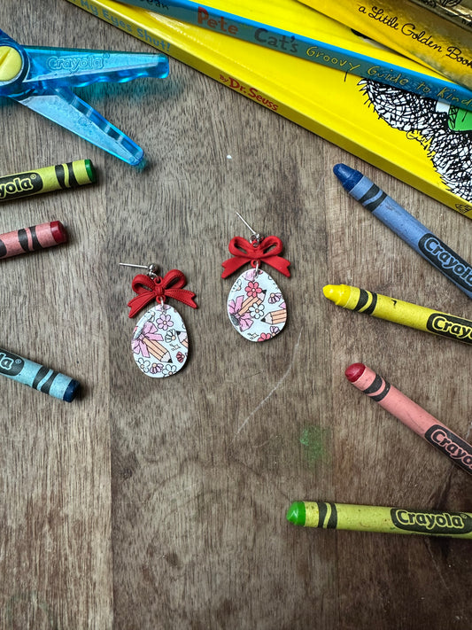 Red bow pencil dangles