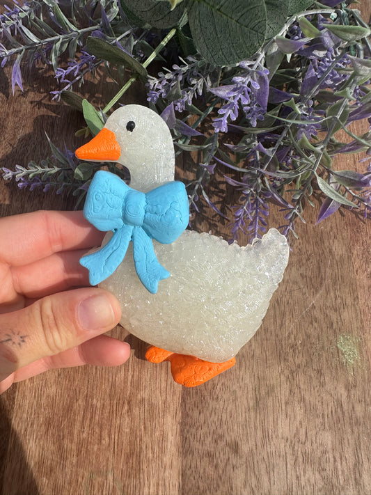 Goose with blue bow