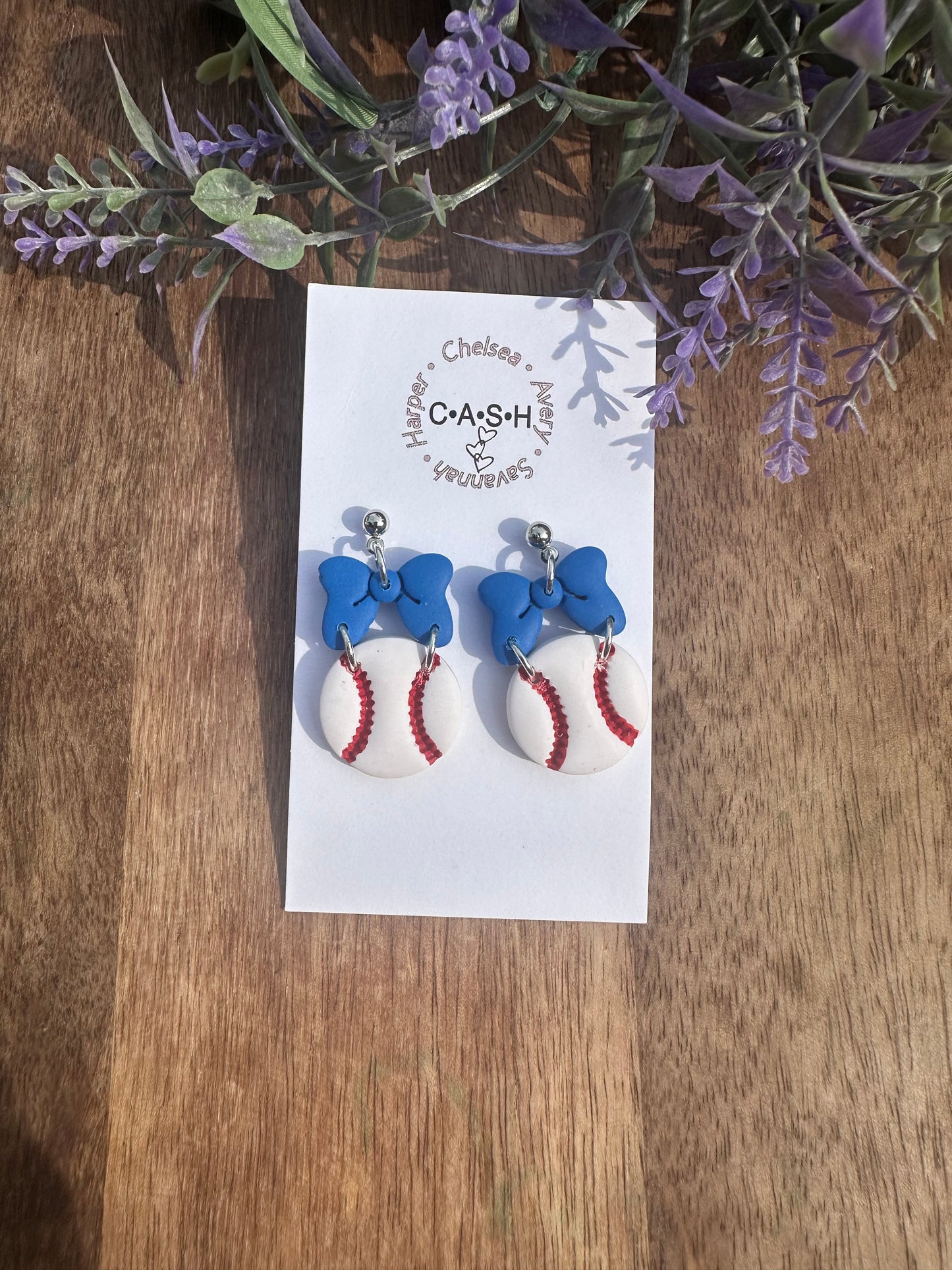 Baseball with blue bow dangles
