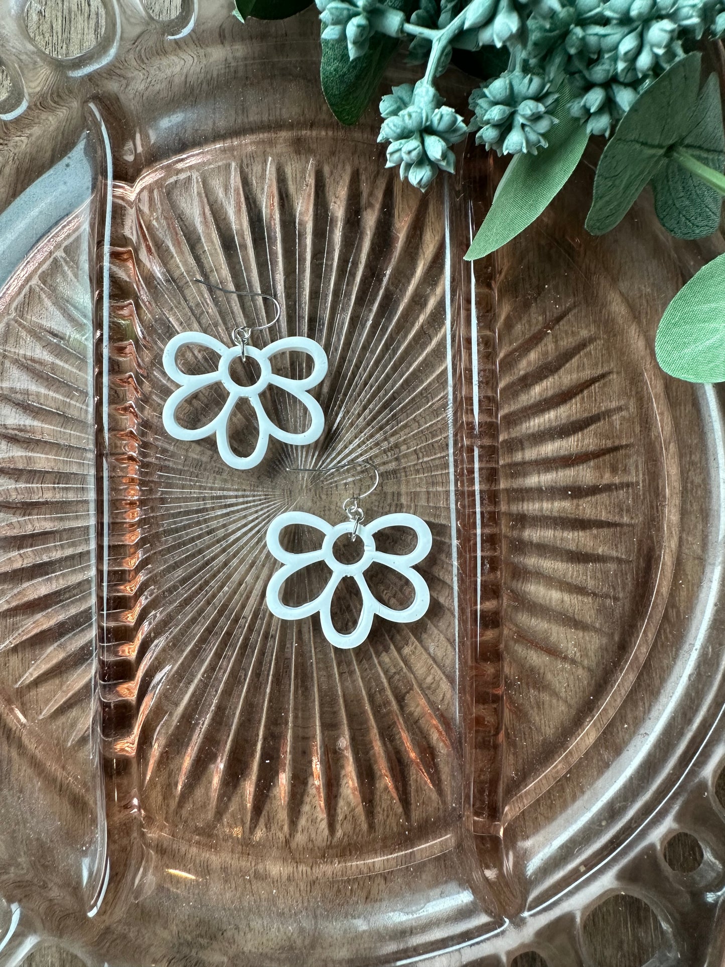 White flower outline dangles