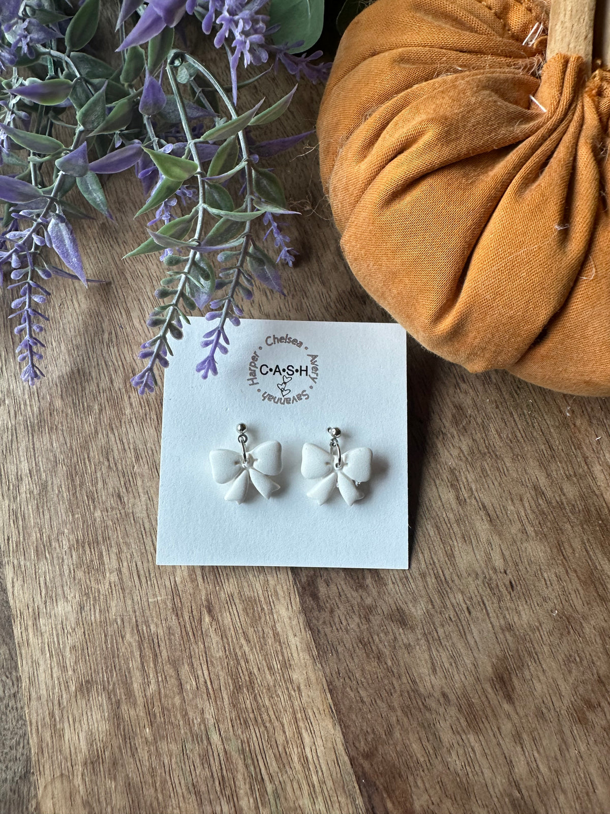 White bow dangles