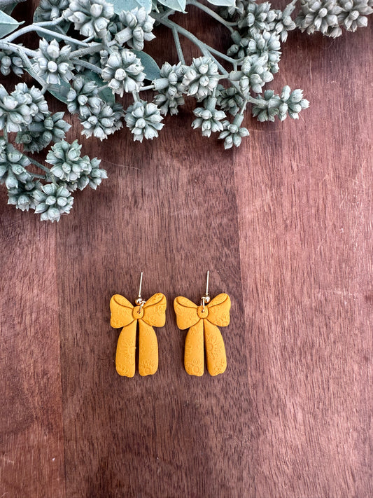 Mustard bows with sunflowers