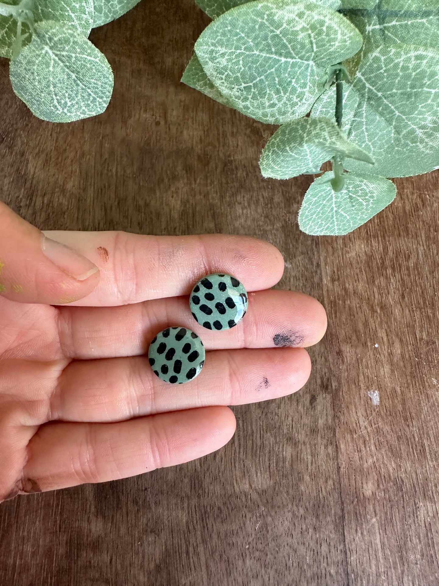 Green with black dot stud earrings