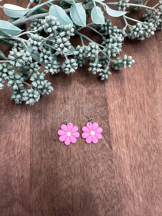 Bright, pink flower dangles ￼