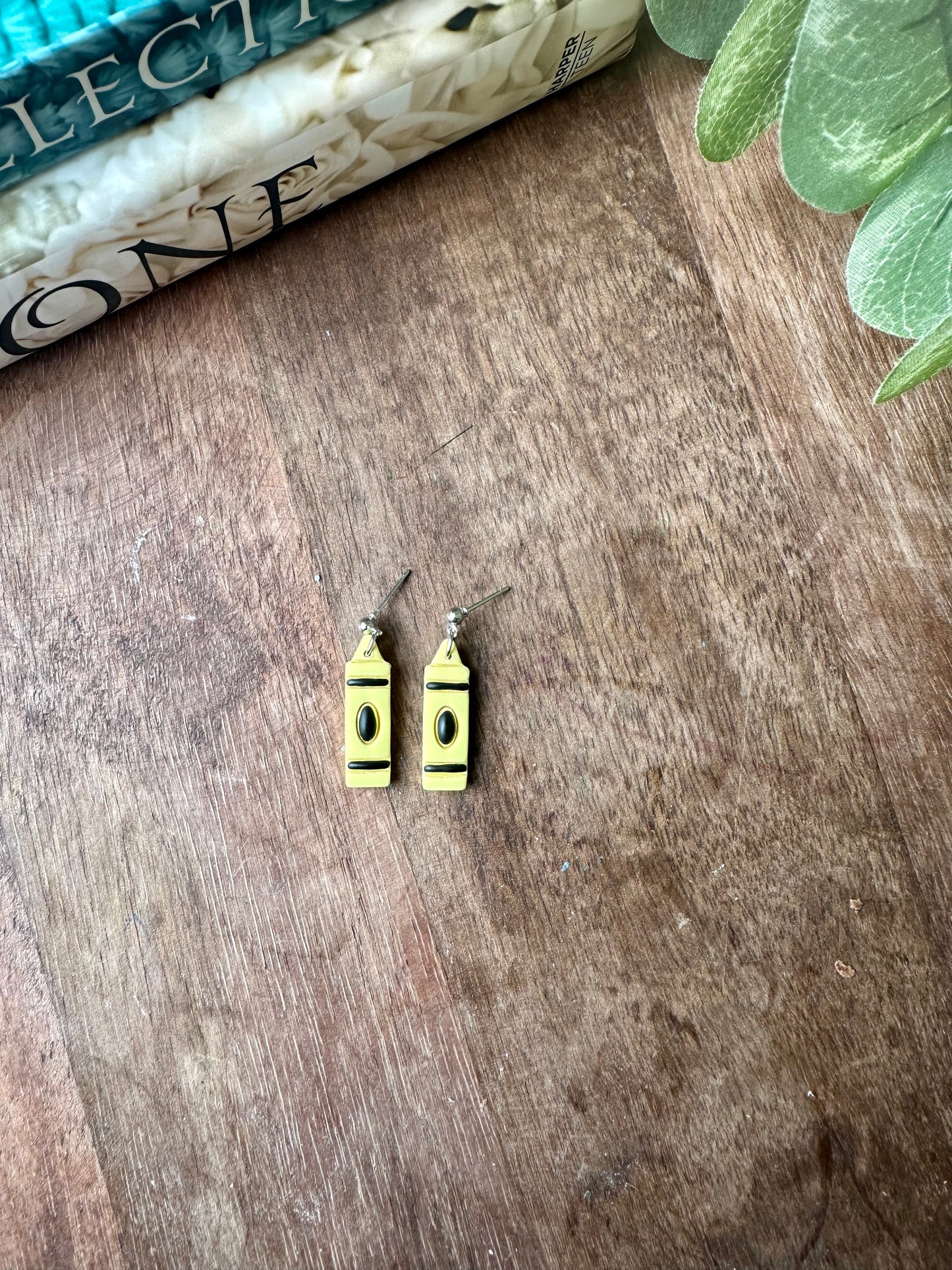 Small yellow crayon ￼earrings