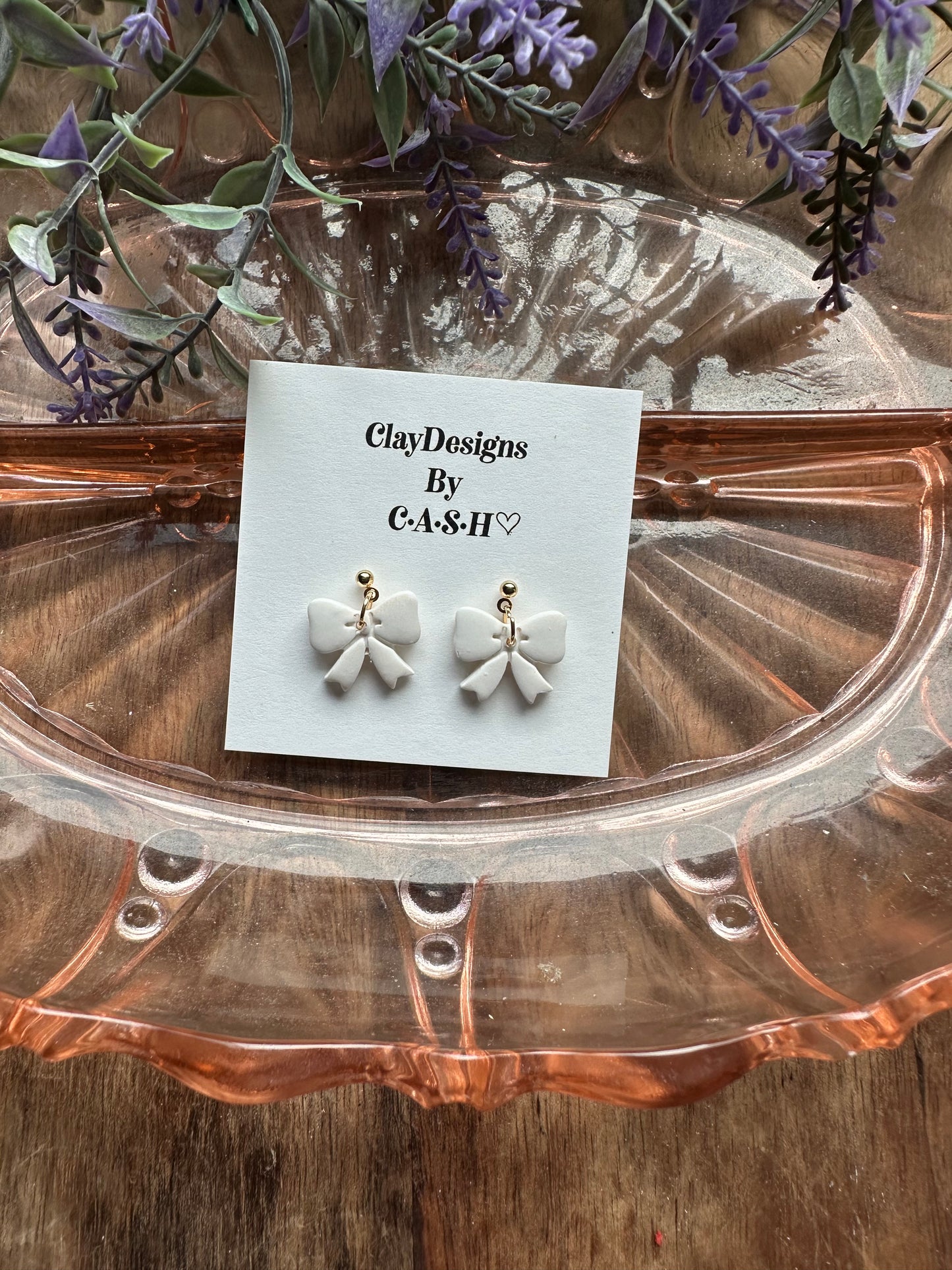 White bow dangles