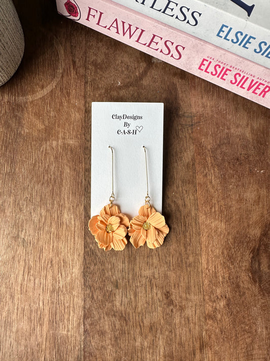 Small orange flower dangles