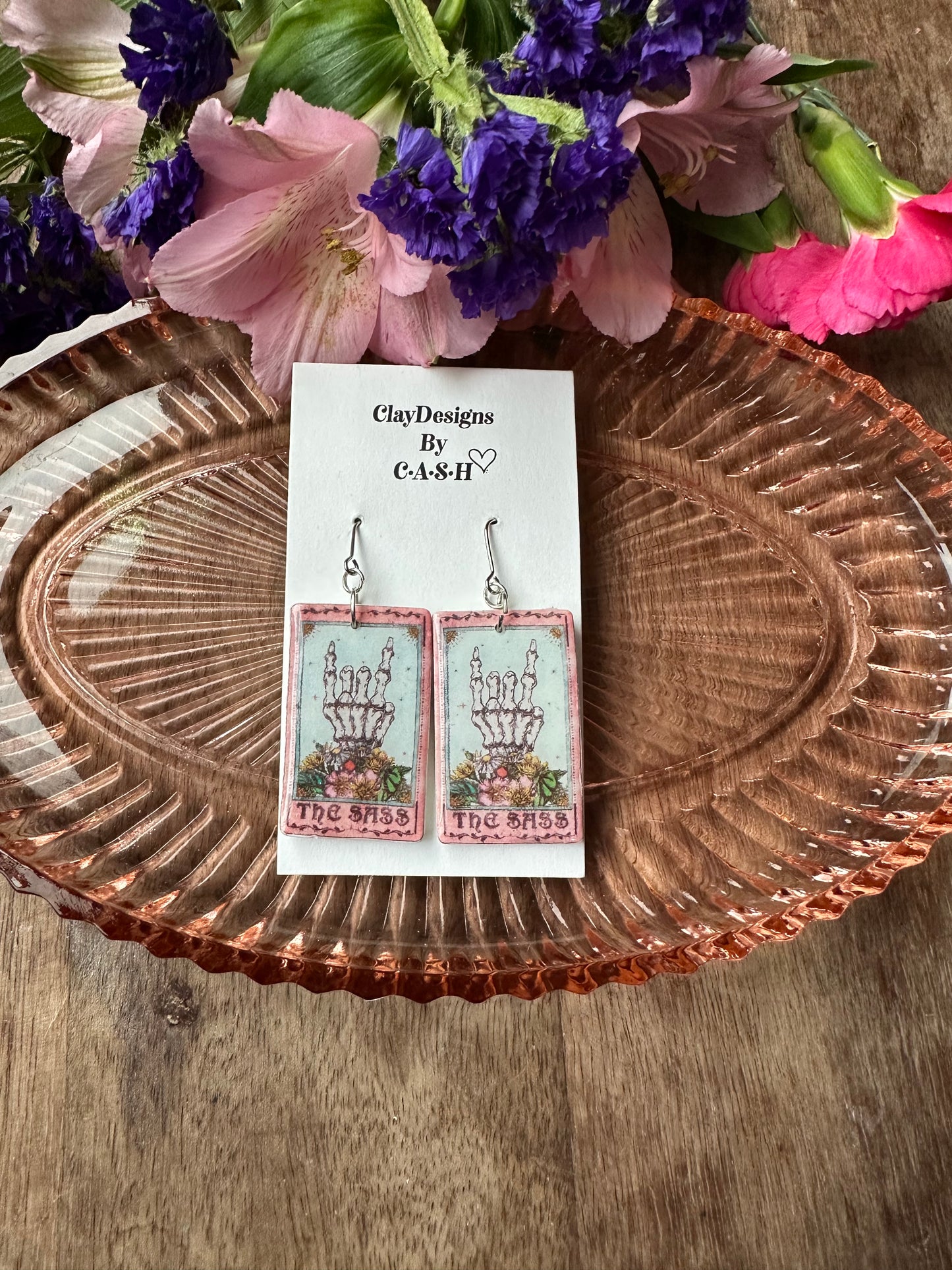 The sass card dangles