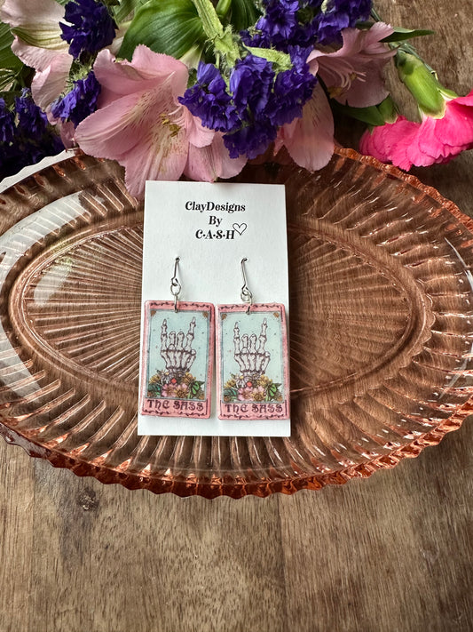 The sass card dangles