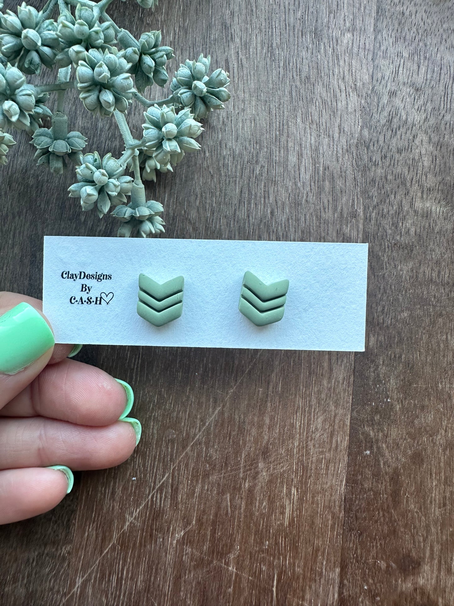 Sage green chevron studs