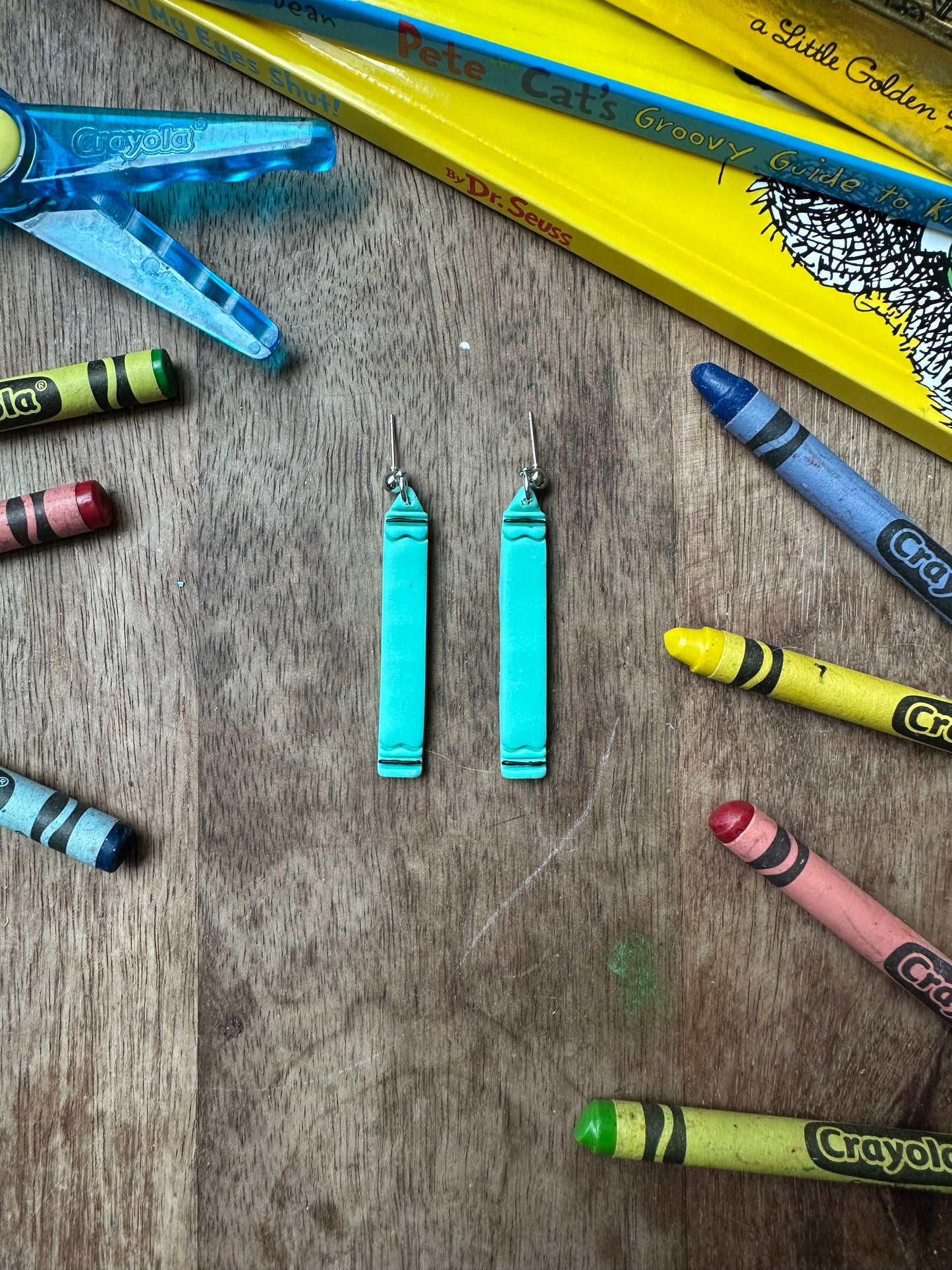 Teal long crayon dangles