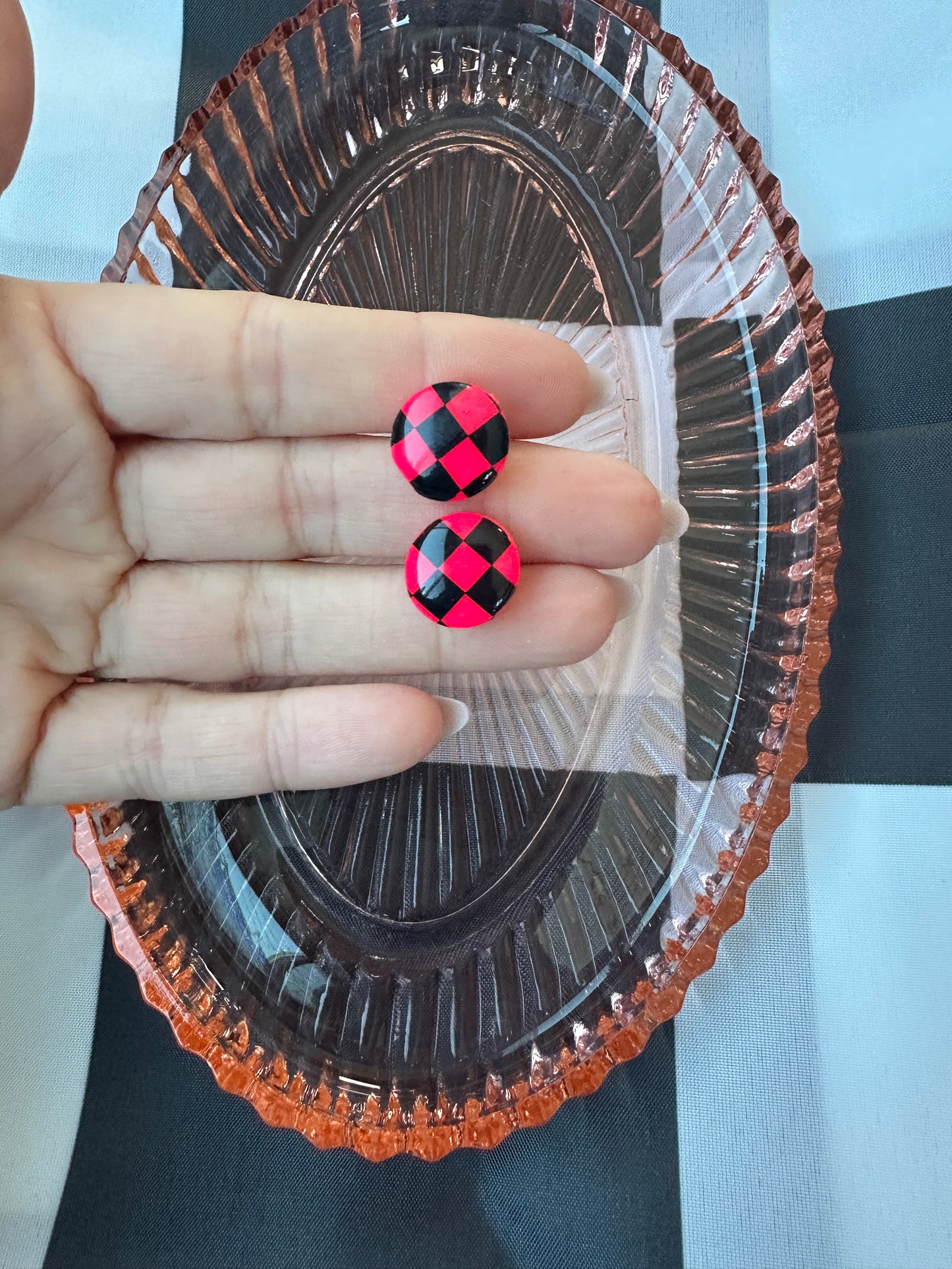 Hot pink checkered circle studs