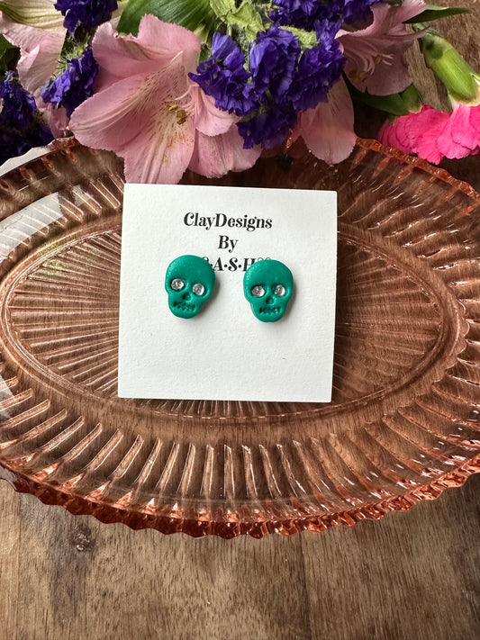 Green glitter skull studs