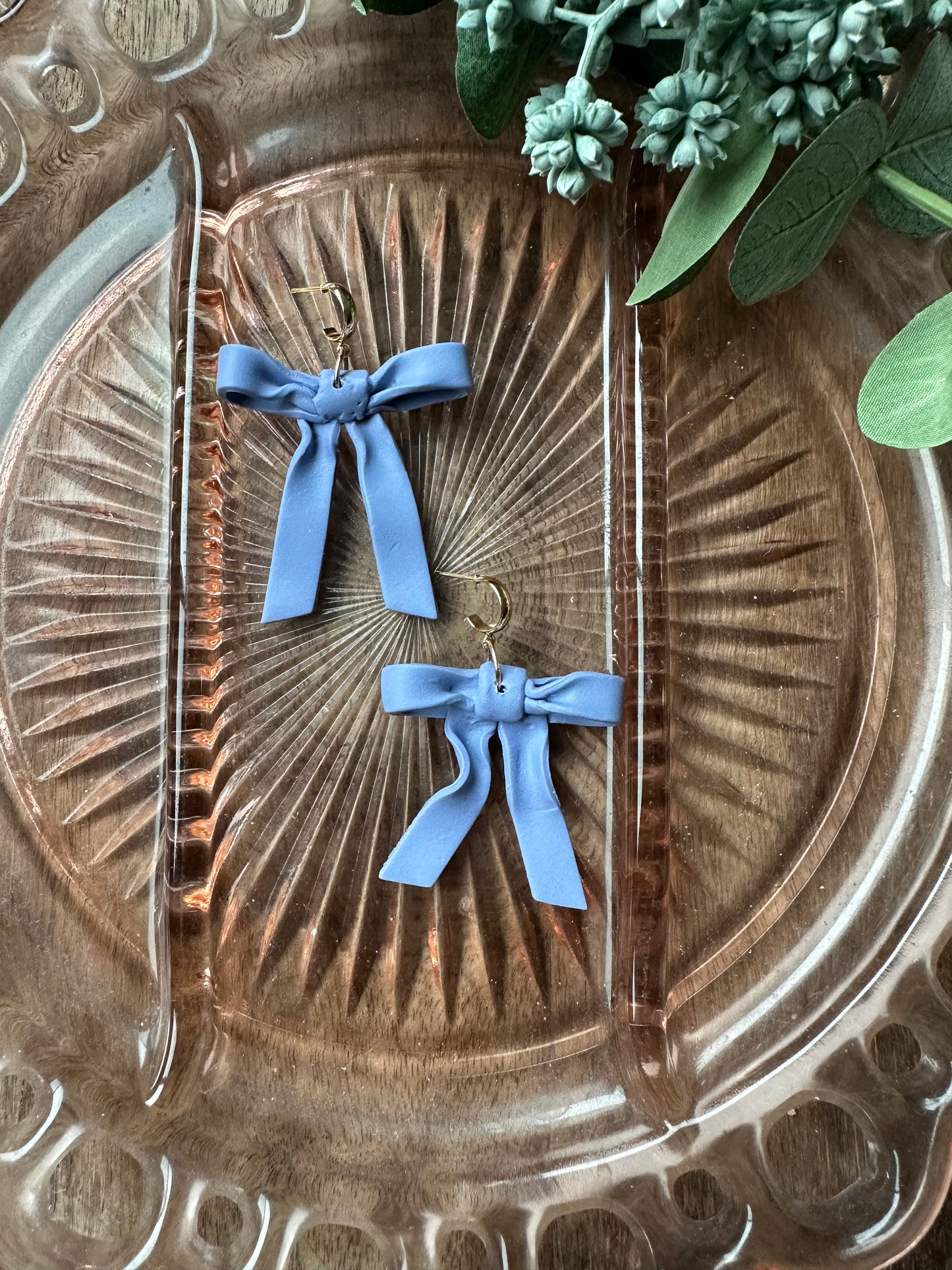 Blue bow dangles