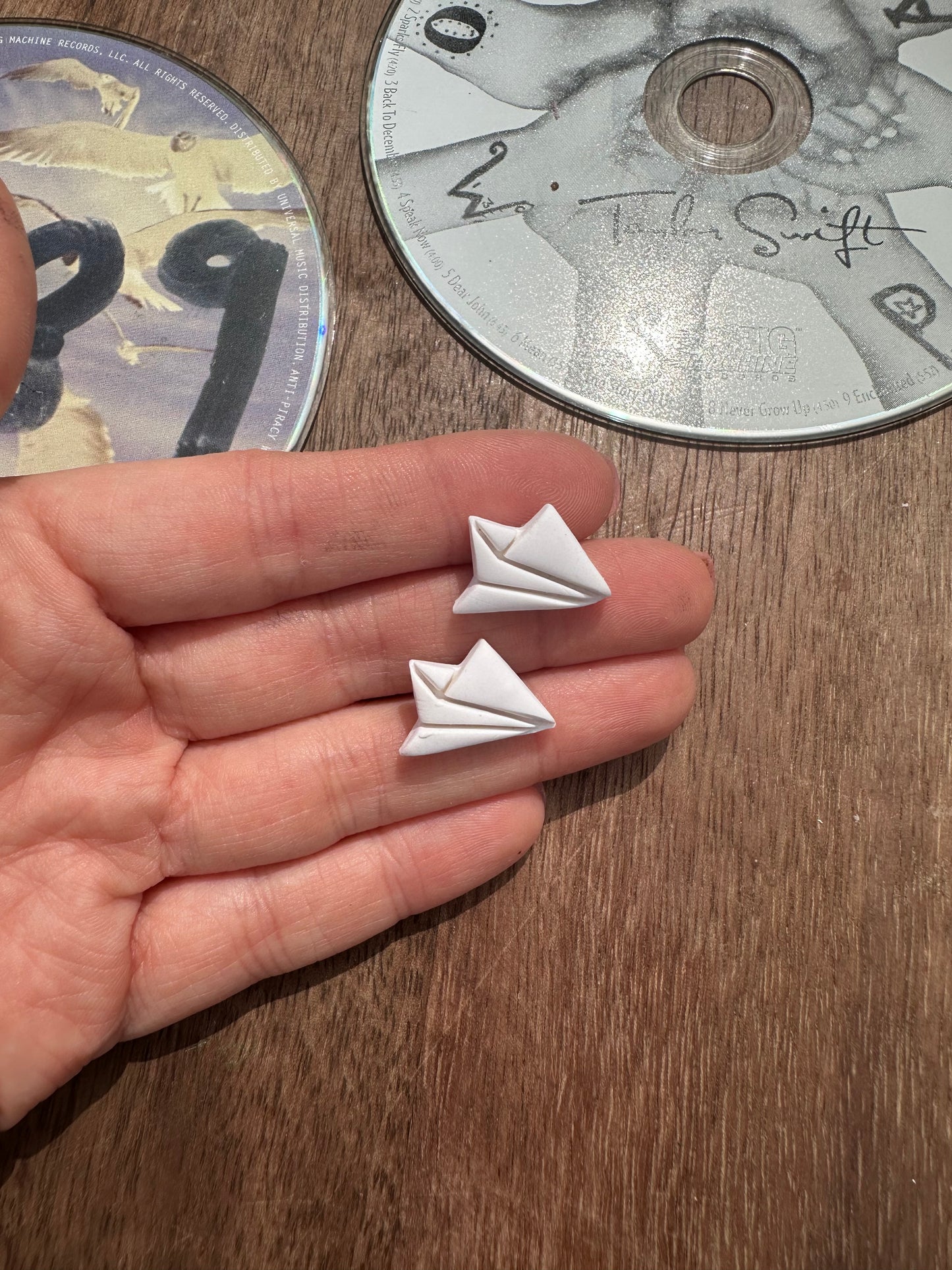 Paper airplane studs