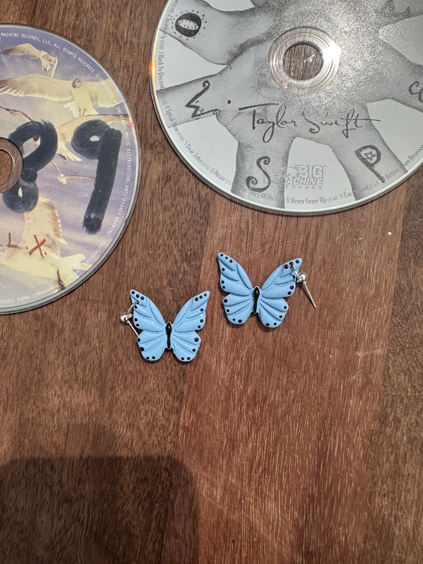 Blue butterfly dangles