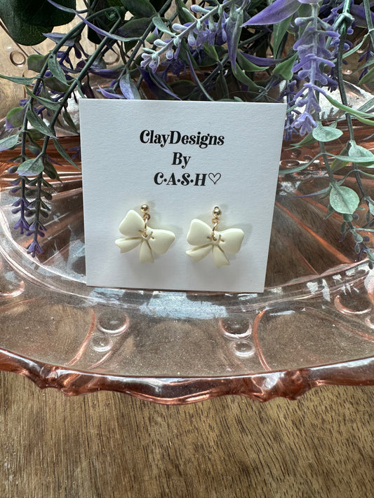 Butter yellow with gold bows
