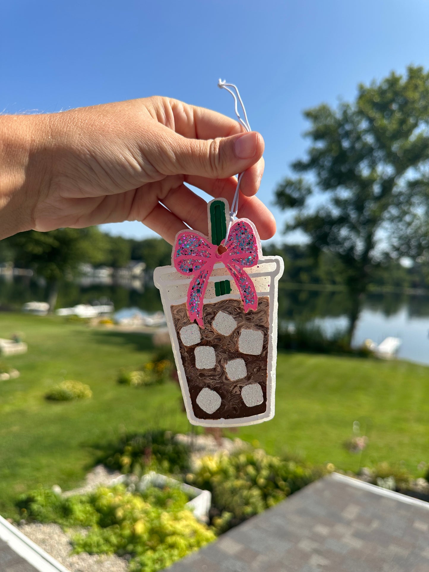 Pink bow with ice coffee