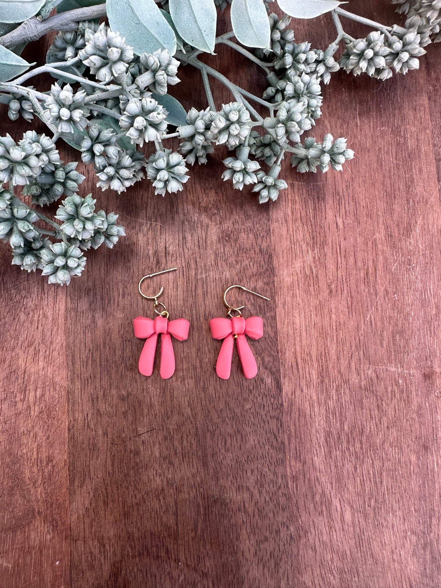 Pink bow dangles