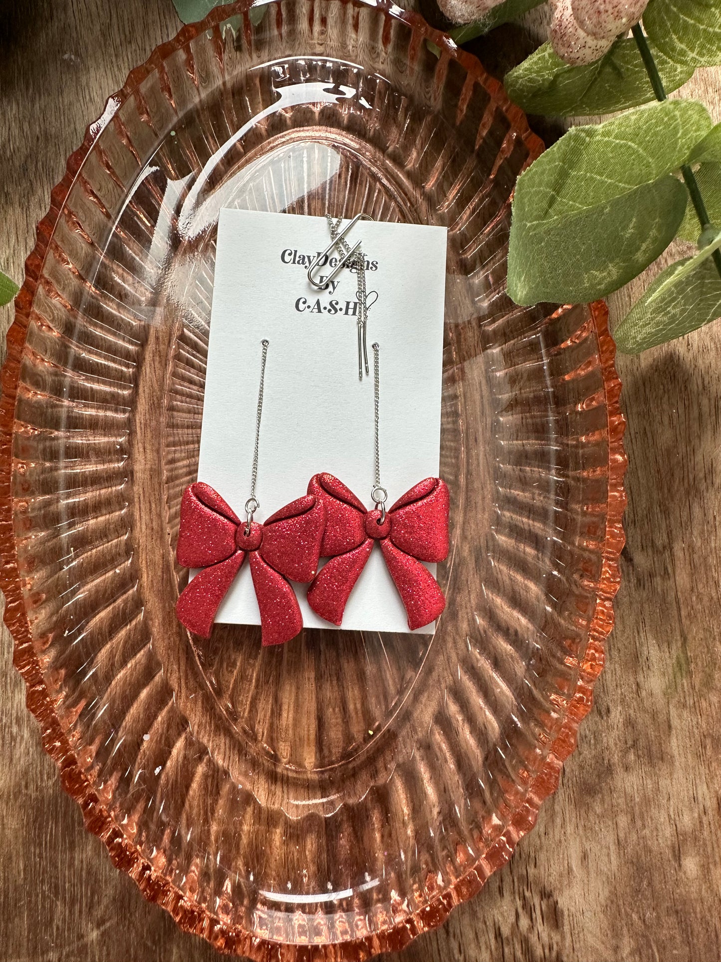 Red glitter bow threaders