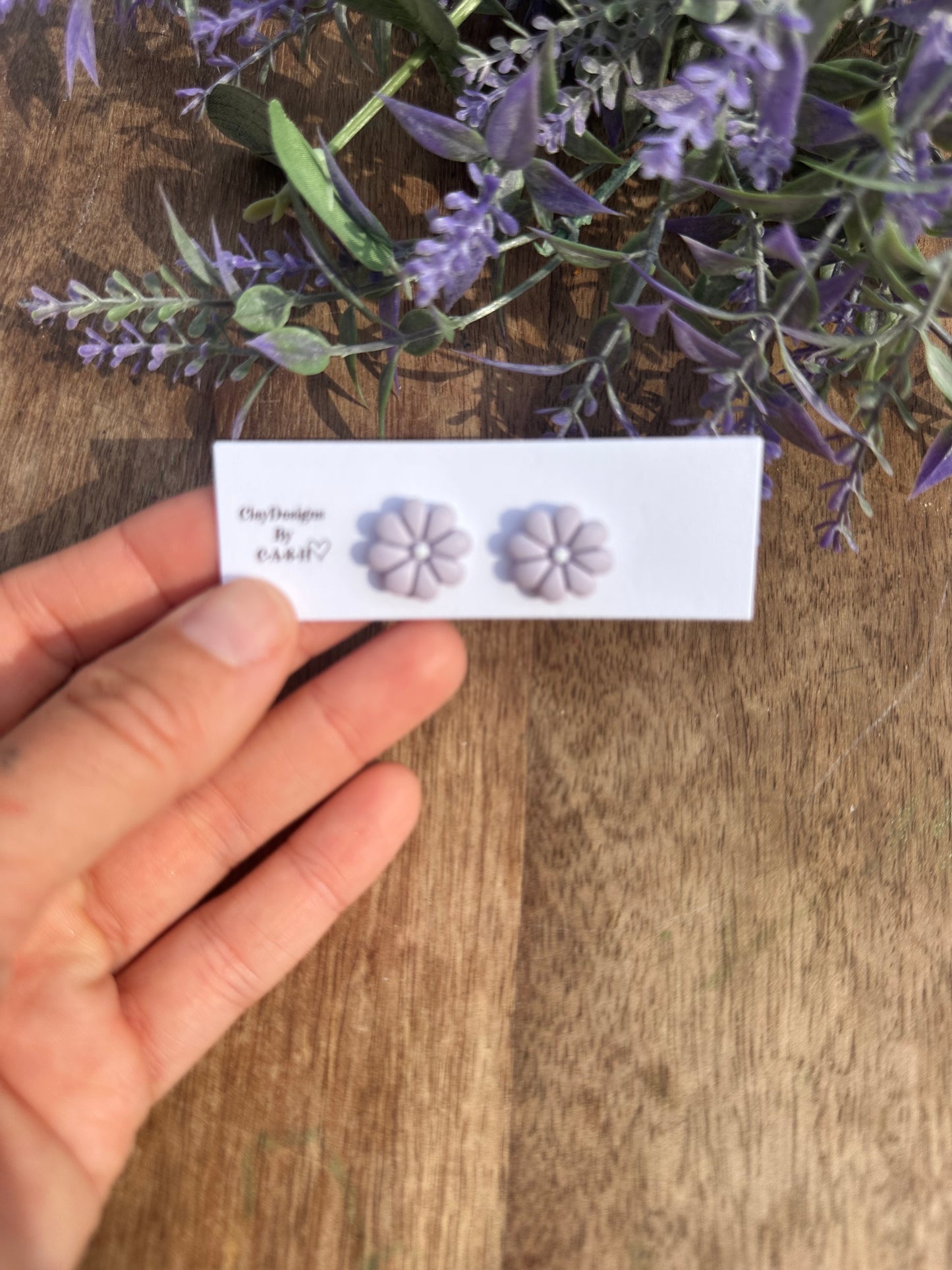 Small purple flower stud