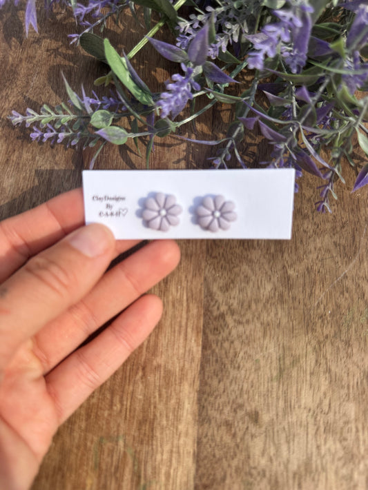 Small purple flower stud