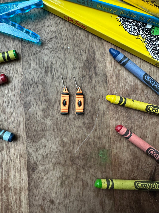 Orange crayon dangles