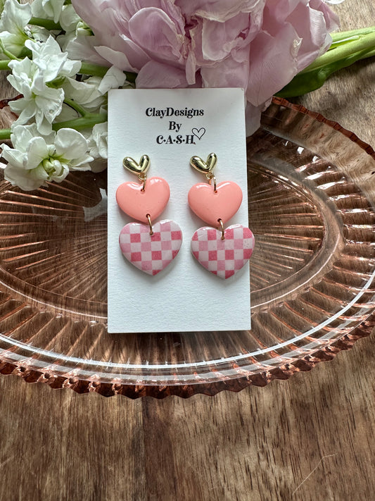 Pink checkered triple heart dangles