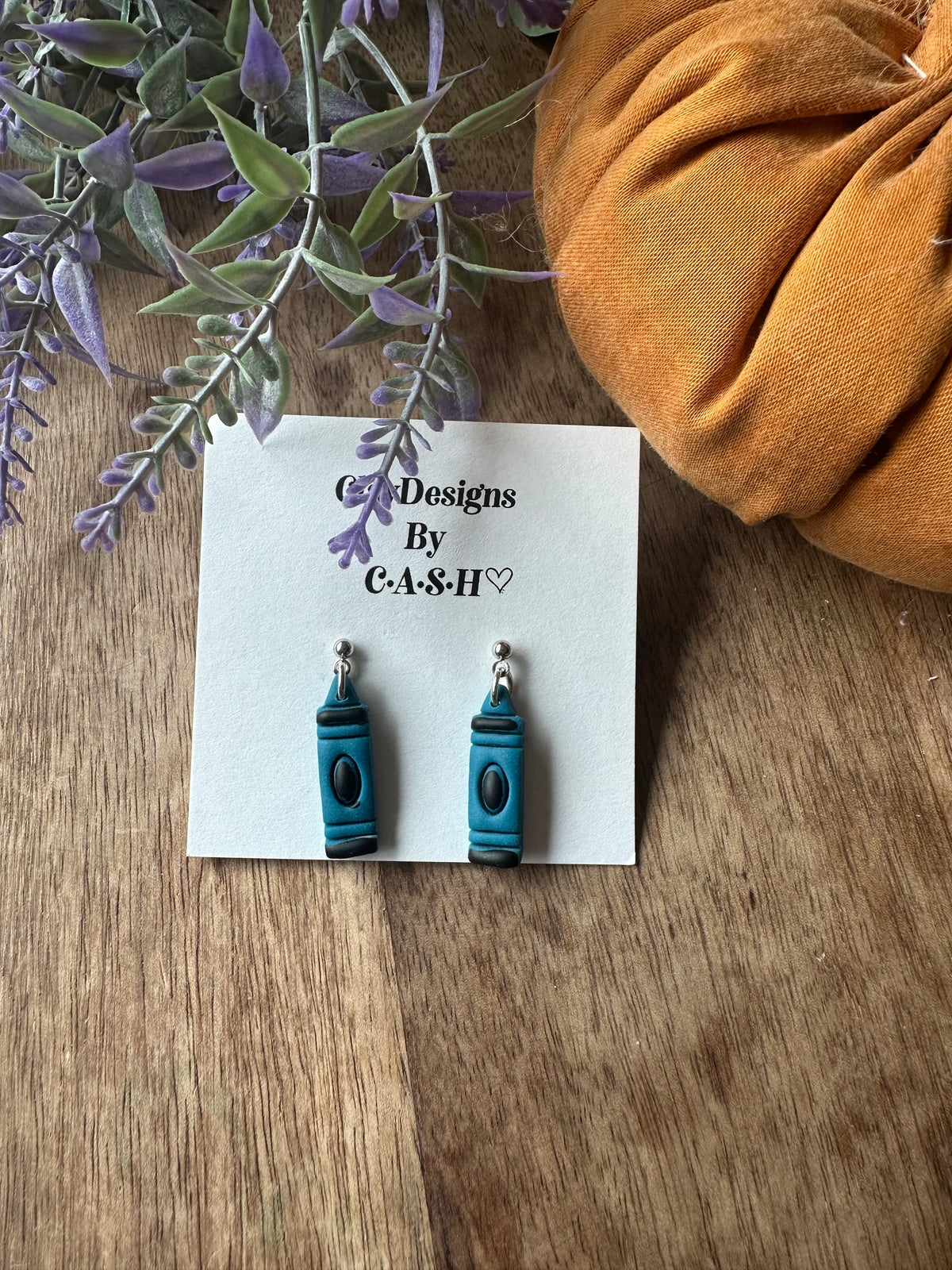 Dark blue crayon dangles
