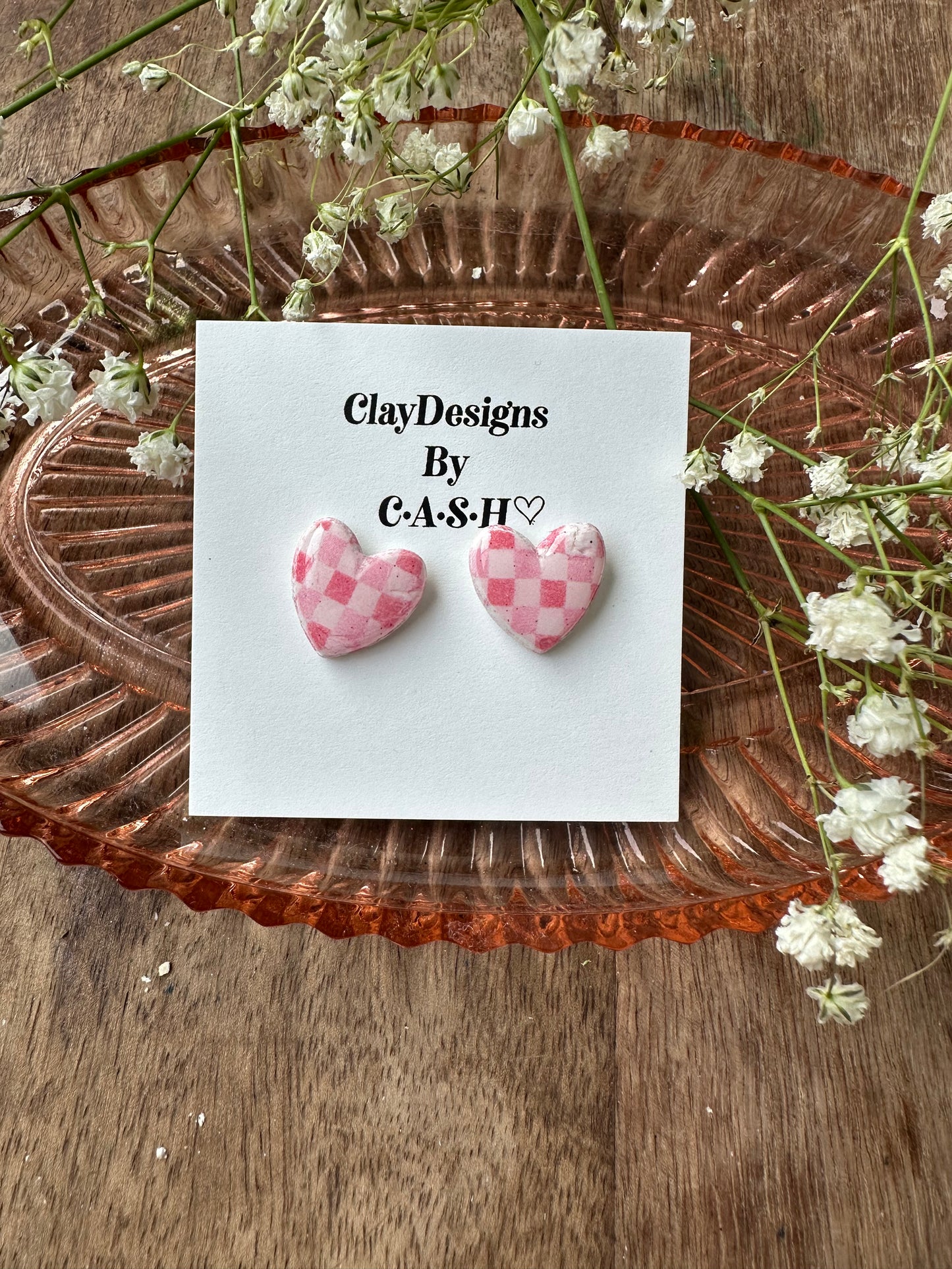 Pink checkered heart studs