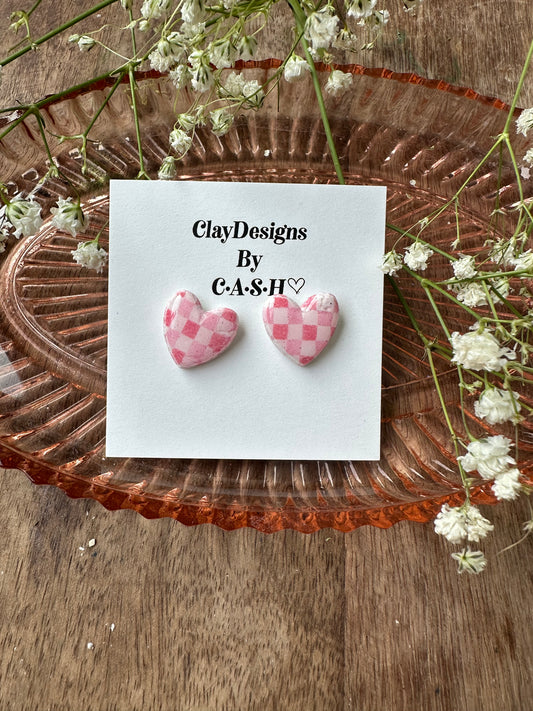 Pink checkered heart studs