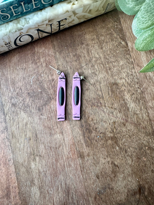 Long purple crayon ￼earrings