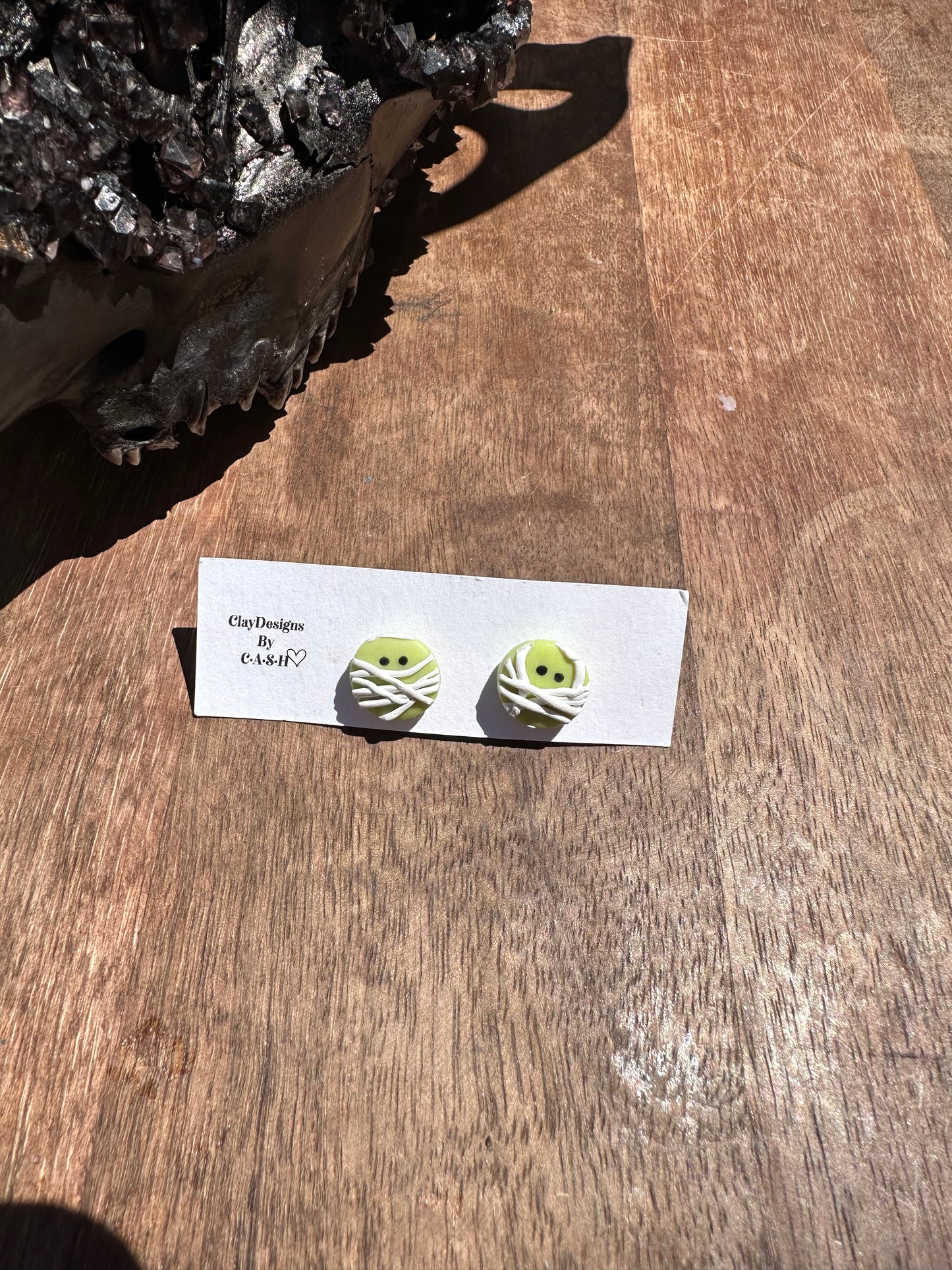 Glow in the dark mummy studs