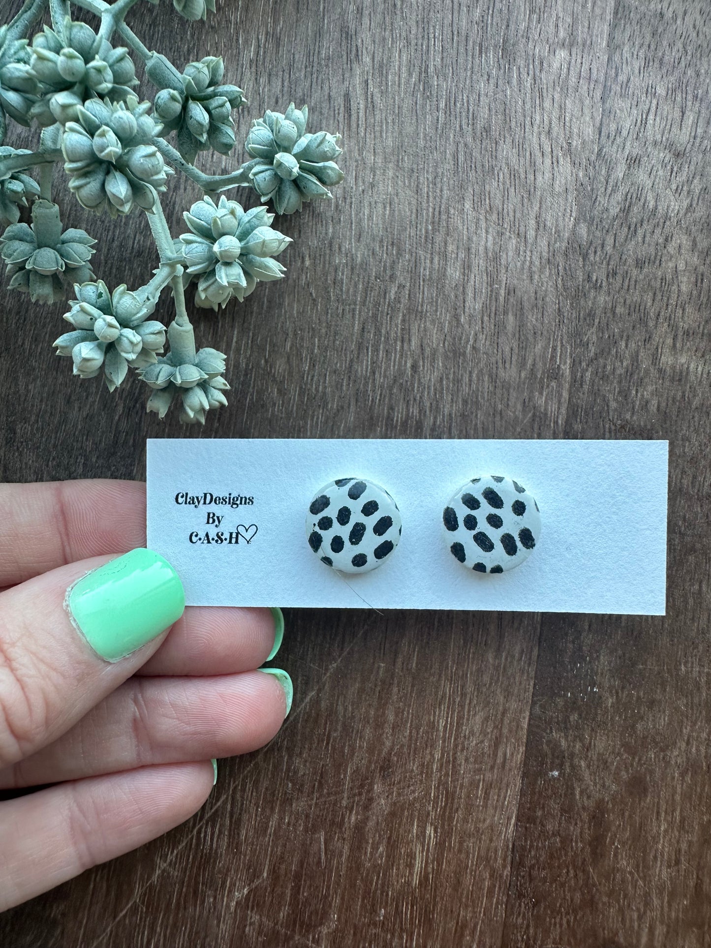 Black dot studs