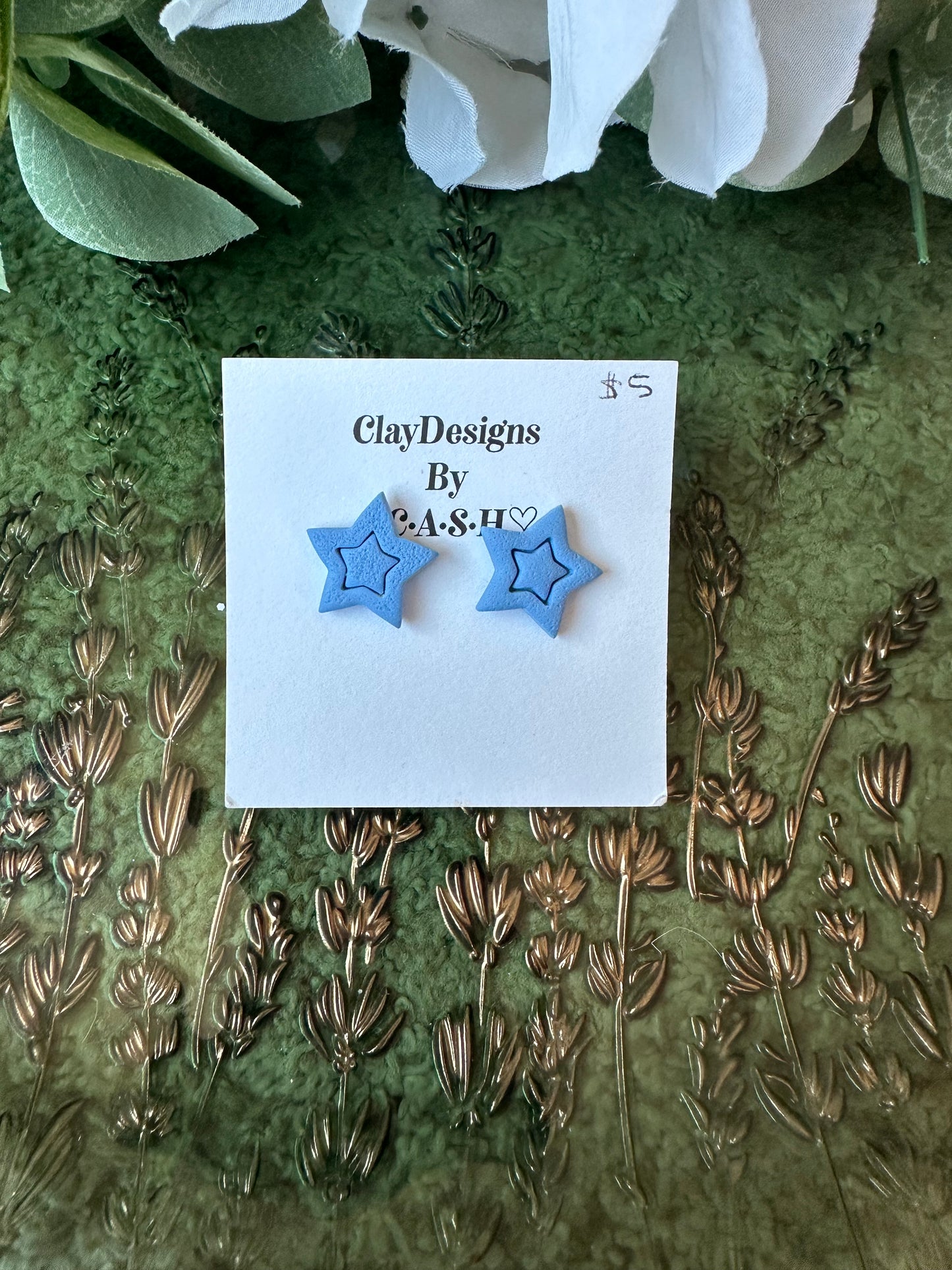Light blue star studs